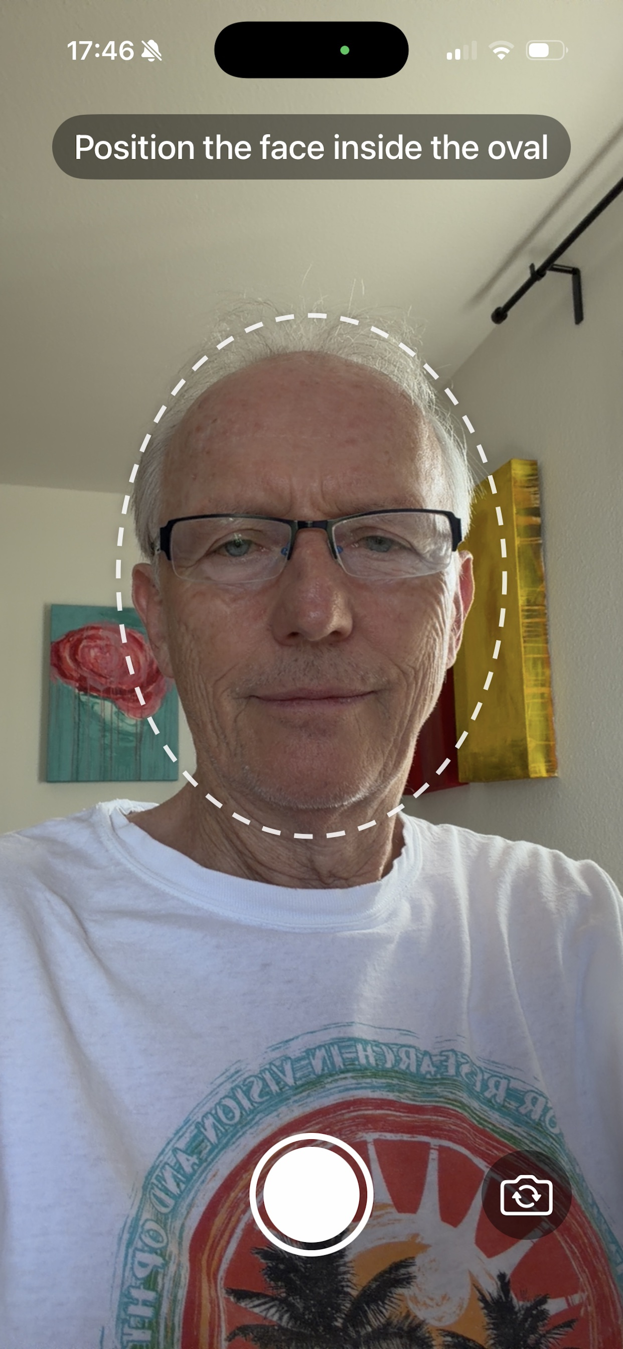 ColorAssim camera screen — position your face in the oval guide